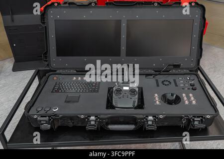 Portable ground control station in heavy-duty case with dual screens, radio transmitter, joystick, and keyboard for UAV drones Stock Photo