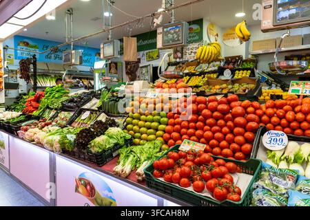 Madrid Spain - August 9 2025: Fresh Produce on Display at a Stall in a Super Market in Madrid Spain Stock Photo