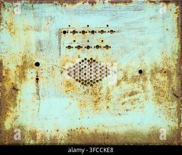 Background texture. The texture of the rusty metal surface with ventilation grille. Stock Photo