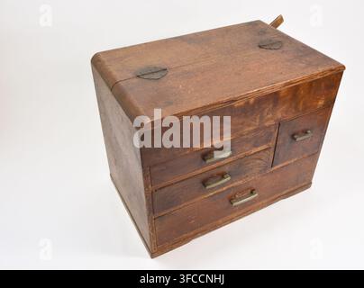Vintage Wooden Sewing Box with Multiple Drawers Isolated on White Background, Traditional Household Item in Japan Stock Photo