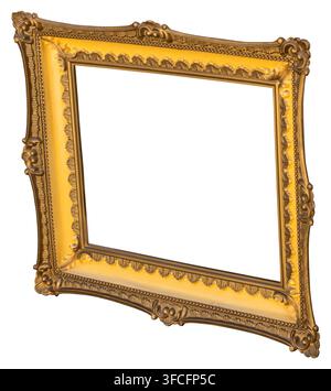 Close-up of an ornate gold picture frame featuring intricate carvings and a metallic sheen. Ideal for showcasing artwork or photographs, this frame adds elegance to any decor. Stock Photo