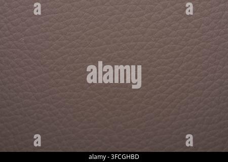 Closeup photo of brown faux leather surface showing detailed grain texture ideal for design and material background applications Stock Photo