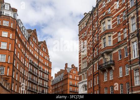 Traditional red brick apartment buildings in London Stock Photo