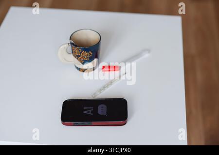 using AI chatbot for medical advice while checking temperature, concept of digital healthcare and online self-diagnosis. Stock Photo