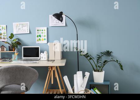 Architecture and interior design workspace, home office with laptop and blueprints for creative planning and professional project development Stock Photo