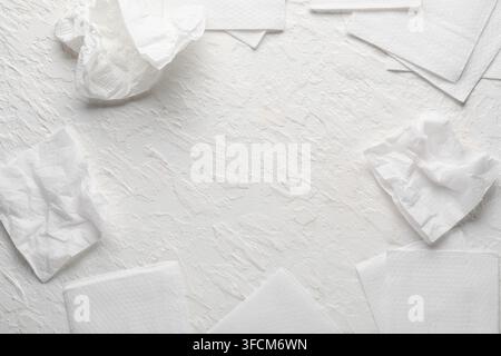 Frame made of paper napkins on white textured background Stock Photo