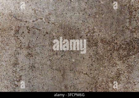 Close-up of a weathered concrete wall showing cut texture grooves and an aged, historic industrial surface. Stock Photo