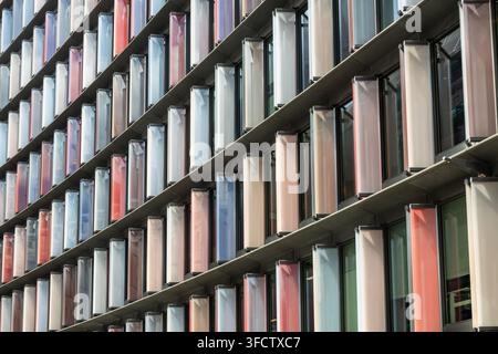 Modern building facade with colorful vertical panels Stock Photo