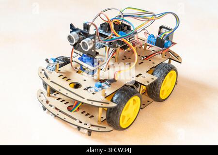 DIY Robot Car Assembly and Components. Educational electronics project for STEM learning and study robotics. Stock Photo