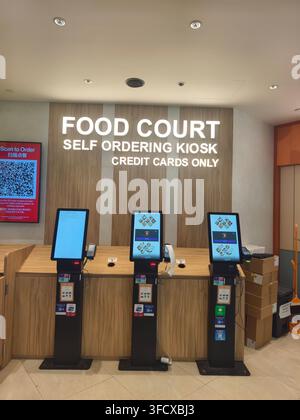 self-ordering kiosks at a food court area, "credit cards only", Changi airport, Singapore Stock Photo
