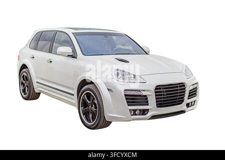 Luxury suv isolated on white background, sleek design, glossy finish, modern grille, angular headlights, black wheels, side mirrors, clean composition Stock Photo
