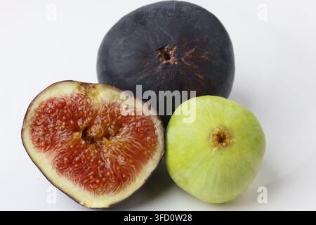 Fresh Halved and Whole Black and Green Figs Stock Photo