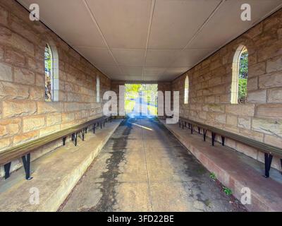 Photograph of the drive through pavilion and accessible rest area at the Katoomba Cemetery in the Blue Mountains in New South Wales, Australia Stock Photo