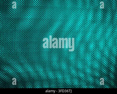 Mesh fabric with undulating movement in swirls shows shadowy mysterious qualities & swirling motion in textures. Soft appearance is soothing background. Stock Photo