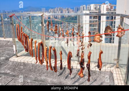 In southern China, it is a winter tradition for every household to sun-dry cured meat(air-dried meat), resulting in a flavorful and savory delicacy.Ji Stock Photo