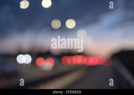 Road transport, car lights on the street, abstract. Stock Photo