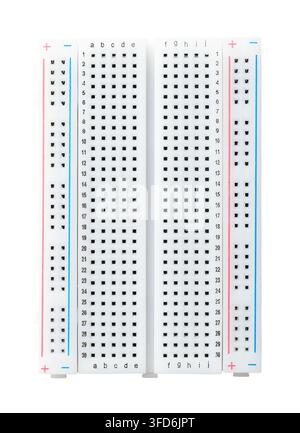 Solderless breadboard, universal prototyping perfboard isolated from above. Used to quickly build and test electronic circuits without any soldering. Stock Photo