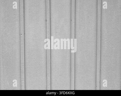Closer view of gray painted board and batten wood showing visible woodgrain, flat surface and modern exterior wood cladding Stock Photo