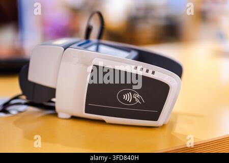 Contactless Card Payment Terminal on Counter Stock Photo