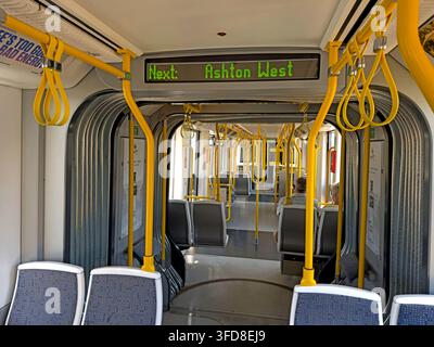 Interior of a westbound Bee Network Metrolink tram leaving Ashton-under-Lyne, Greater Manchester. Stock Photo