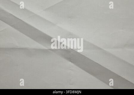 White paper creating abstract diagonal lines and shapes with subtle shadows Stock Photo