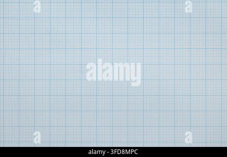 Graph paper texture with fine blue grid lines creating a structured background Stock Photo
