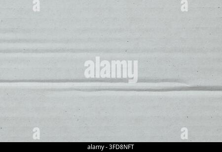 White cardboard surface showing textured pattern and horizontal lines Stock Photo