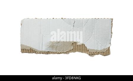 Torn corrugated cardboard piece with white paper isolated on a white background Stock Photo