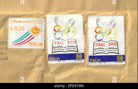 Italian postage stamps set with 0.25 Euro priority issue and pair of 2021 Manifesto di Ventotene 80th anniversary stamps on paper background Stock Photo