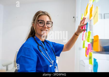 Medical professional collaborating on healthcare concepts with sticky notes Stock Photo