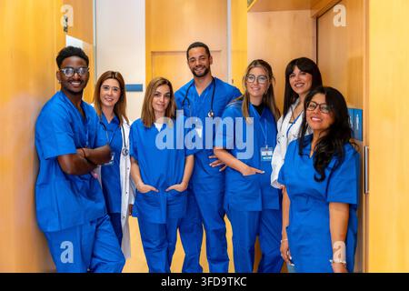 Diverse healthcare professionals team smiling and standing together Stock Photo