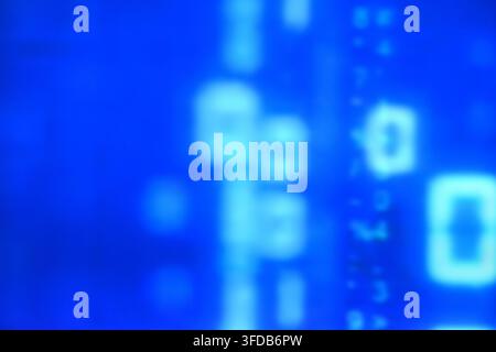 blurry binary number system on blue computer screen background and texture Stock Photo
