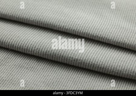 Grey ribbed cotton fabric showing a close-up texture background Stock Photo