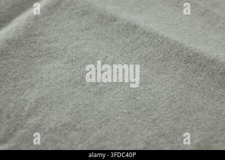 Gray cotton jersey fabric shows a soft, comfortable textile background with visible texture Stock Photo