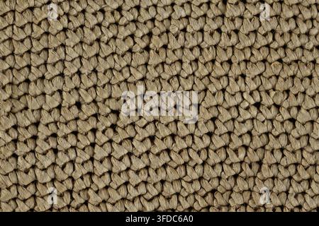 Close-up showing coarse natural jute fiber woven into a rustic texture background Stock Photo
