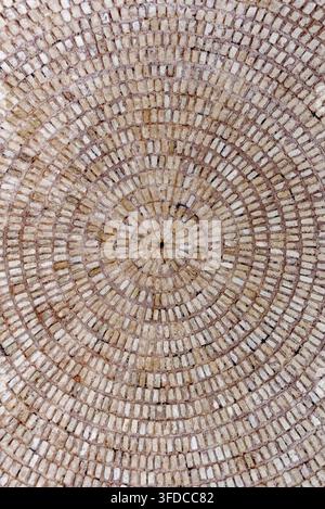 Macro view looking up into an intricate circular concentric brickwork ceiling dome in Hammat-al-Jarid. Photographed on 8.10.2024 Stock Photo