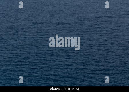 Dark blue ocean surface with gentle ripples and textured natural pattern Stock Photo