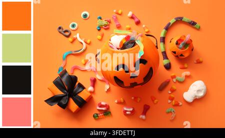 Halloween celebration and trick or treat concept, jack o lantern candy bucket with assorted gummy sweets and gift box on an orange background Stock Photo