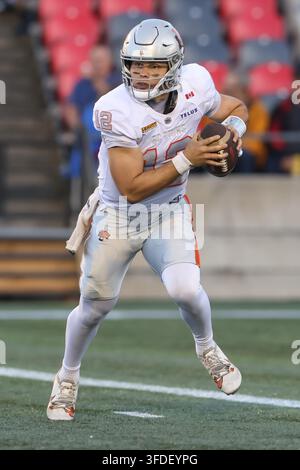 B.C. Lions quarterback Nathan Rourke (12) runs the ball for a first ...
