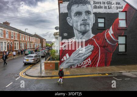 Liverpool, UK. Large street art mural of footballer Andy Robertson by MurWalls on an Anfield building, reading "Born in Glasgow, Made in Liverpool". Stock Photo