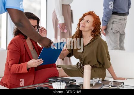 Business colleagues collaborating on a project in office Stock Photo