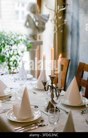 Elegant dining table set for a formal dinner Stock Photo