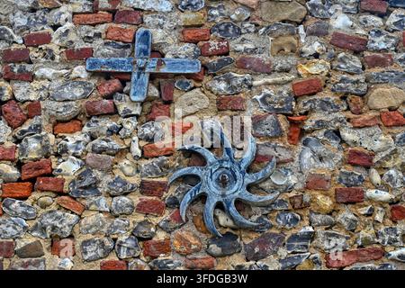 Abstract background detail of the wall of a building on the Norfolk coast made from brick, chalk and flint Stock Photo