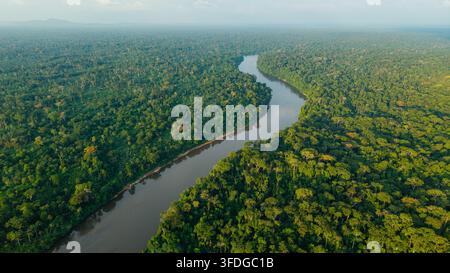 Aerial view of the Cross River flowing through the lush green landscape ...