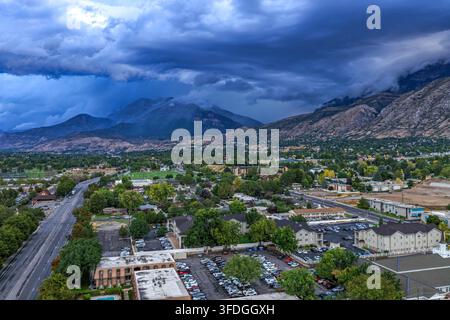 Aerial view of the urban landscape of Provo and Orem with a dramatic thunderstorm rolling over the Wasatch Front mountains in Utah Valley, Provo, Utah Stock Photo