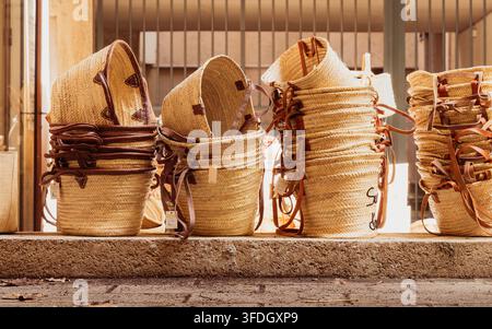 Traditional handwoven baskets displayed outside a local shop in the historic center of Avignon, France Stock Photo