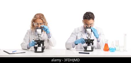 Scientists working with microscopes isolated on white background Stock Photo