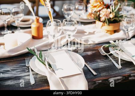 Candles and accessories, plates and napkins and card with empty space Stock Photo