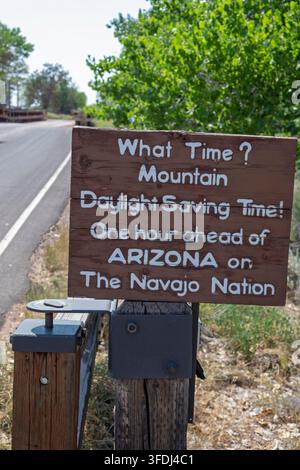 Ganado, Arizona - A sign at the entrance to the Hubbell Trading Post National Historic Site warns visitors that the Navajo Nation observes Daylight Sa Stock Photo
