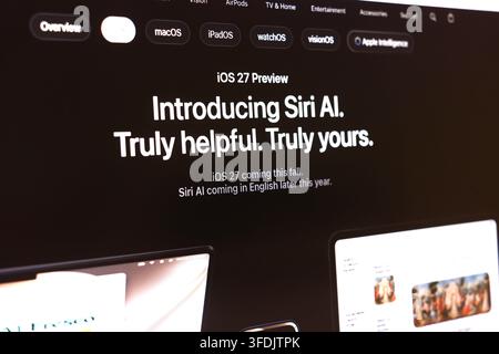 Computer screen displaying iOS 27 preview webpage introducing Siri AI voice assistant. Presentation of new artificial intelligence features for smartp Stock Photo